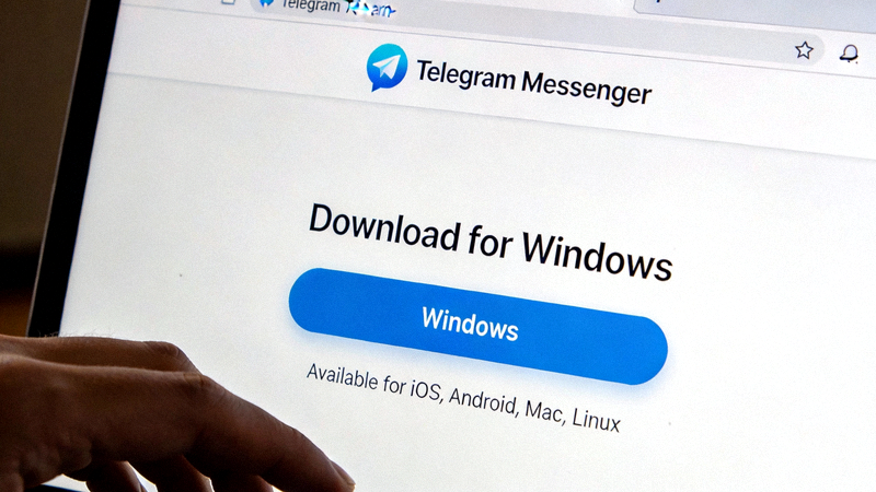 Telegram官方网站下载页面截图，显示Download for Windows按钮